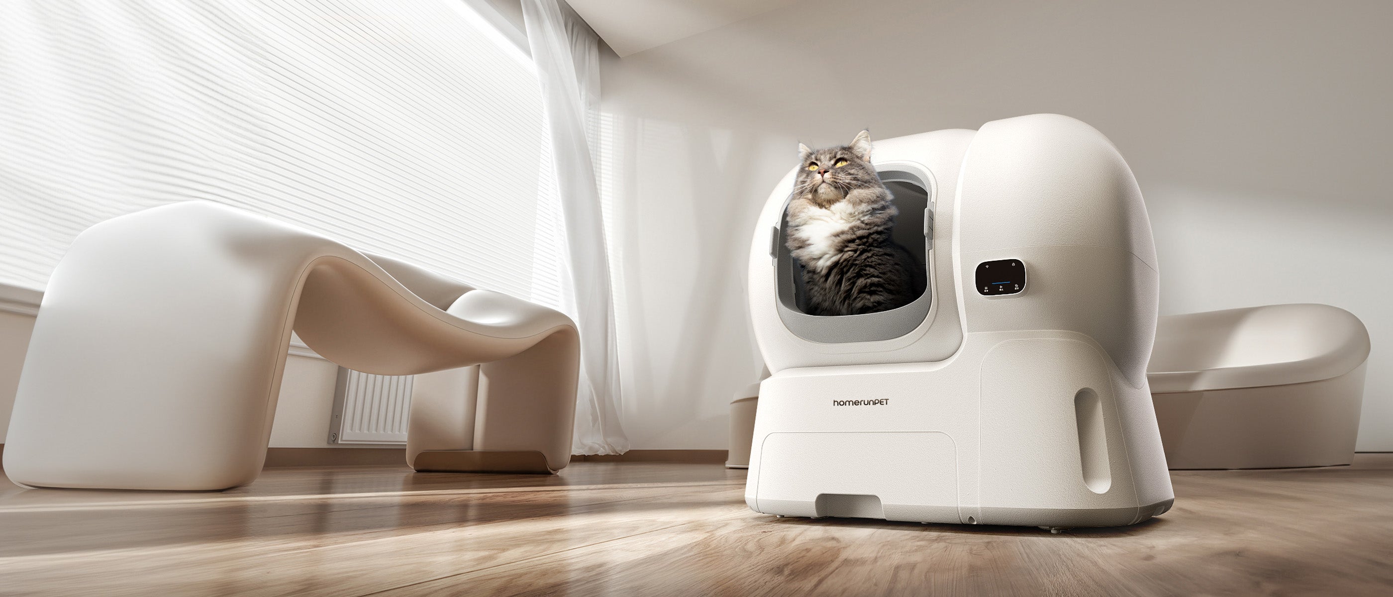 A Maine Coon Cat using a Homerunpet self-cleaning  litter box in a modern indoor setting